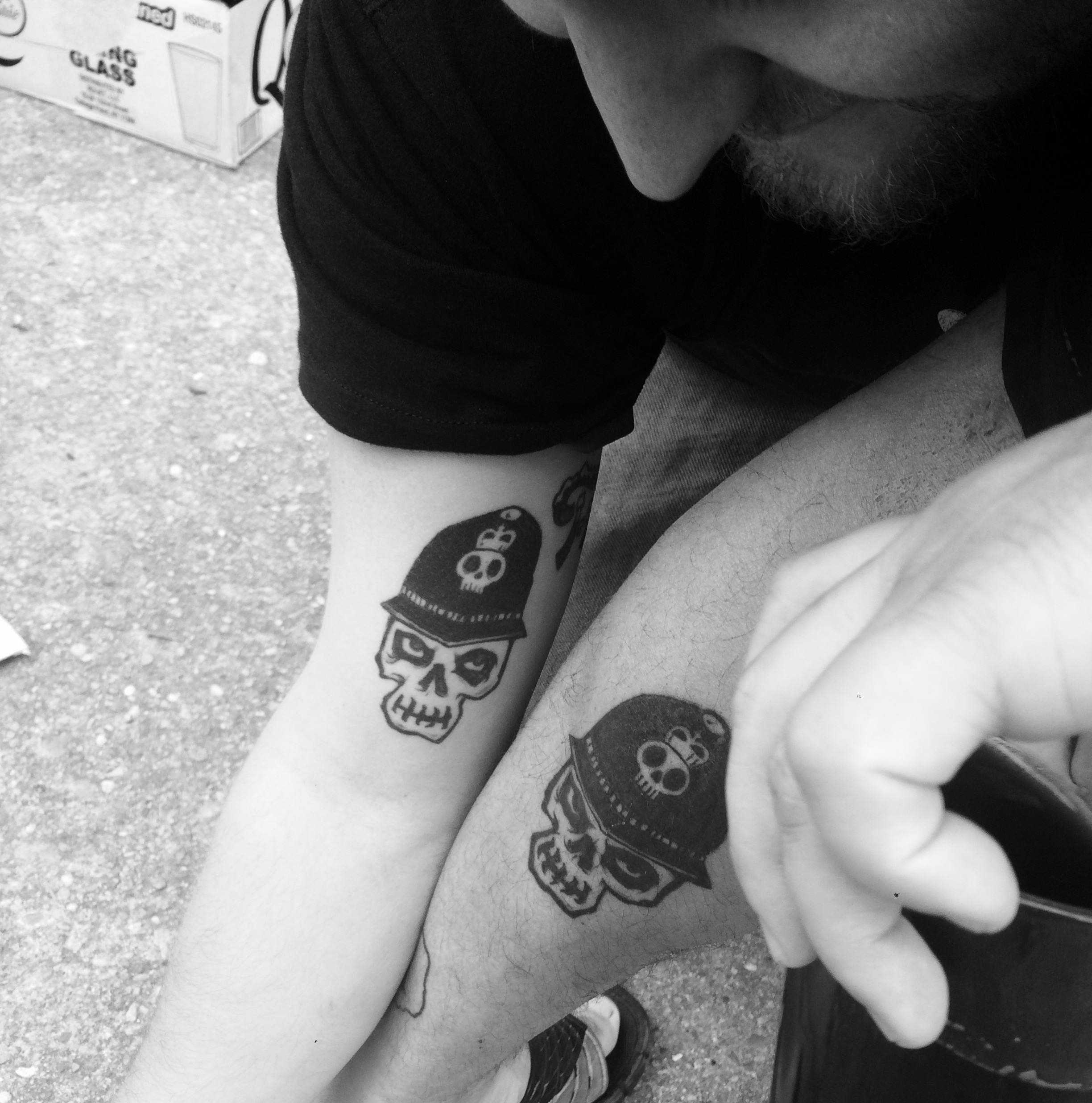 Zach Clark and Zach Cousins showing off their matching tattoos Saturday at Brashland